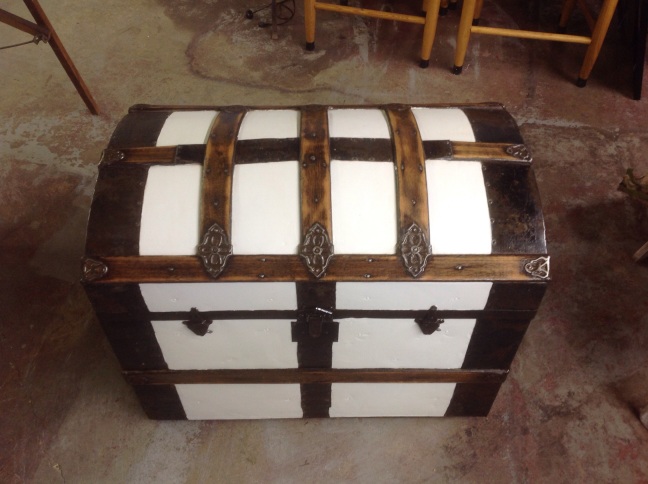 Vintage, rounded top trunk with beautiful wood and metal wood